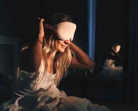 A women successful a slumber mask.