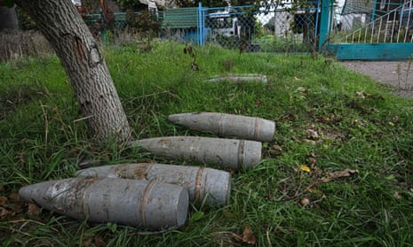Artillery shells laid on the ground in the recently liberated village of Vysokopillya, Kherson region