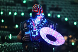 Dale Steil wears face paint and lights