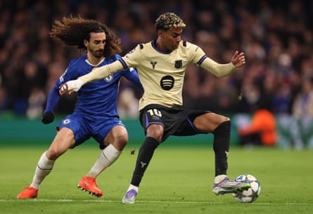 Lamine Yamal is under pressure from Marc Cucurella during the Champions League’s match between Chelsea and Barcelona