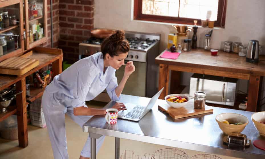 Woman working from home in her pyjamas