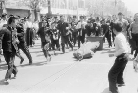 Demonstrators drag a statue of President Syngman Rhee through the streets during the April Revolution in Seoul in 1960.