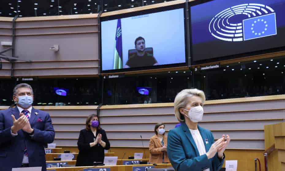 The European parliament applauds Volodymyr Zelenskiy on Tuesday.