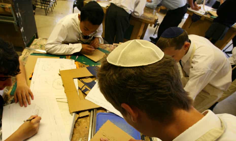 Students at a Jewish school in London. The report said that, worldwide, Jews had an average of 13.4 years of schooling.