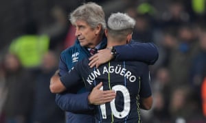 Sergio Agüero embraces his former coach, Manuel Pellegrini, after leaving for Manchester City.