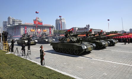 North Korean tanks roll past during a parade for North Korea’s 70th anniversary.
