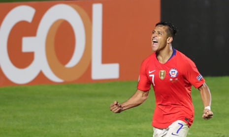 Alexis Sánchez celebrates scoring for Chile against Japan in the Copa América.