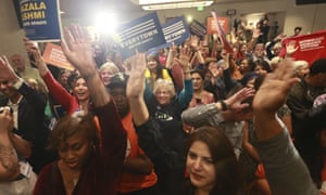 Democratic supporters cheer their candidates at a Democratic Party victory celebration in Richmond, Va., Tuesday, Nov. 5, 2019. All seats in the Virginia House of Delegates and state Senate are up for election. (AP Photo/Steve Helber)