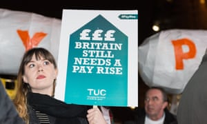 Trade
unionists protest against the public sector pay cap outside
parliament in October.