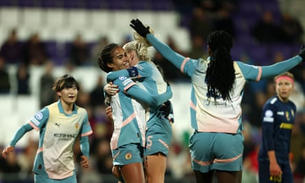 Mary Fowler (second from left) feels the love from her teammates after her decisive goal.