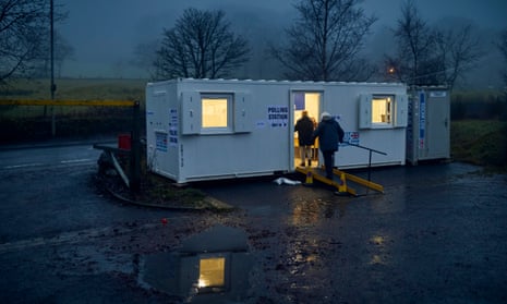 Voters arriving at a mobile polling station at Holcombe village in the marginal Bury North constituency.
