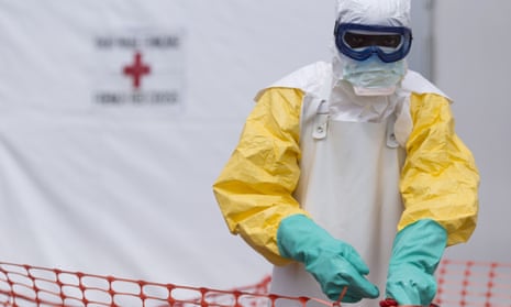 A health worker at an Ebola treatment centre in Guinea.