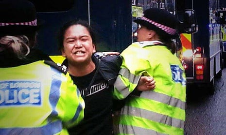 Tibetan activist Sonam Choden, 31, is arrested by Metropolitan police officers. 