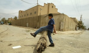 An Iraqi boy plays in front of a closed synagogue in Baghdad, 2003. Iraq’s Jewish community numbered more than 100,000 in the 1930s
