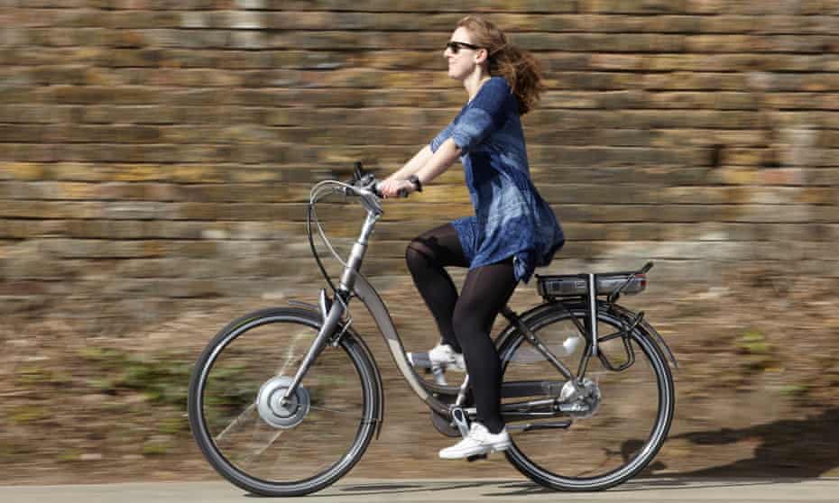 A woman on an e-bike