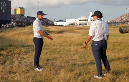 Bryson DeChambeau talks to an R&A rules charismatic connected nan 18th spread of his 3rd round