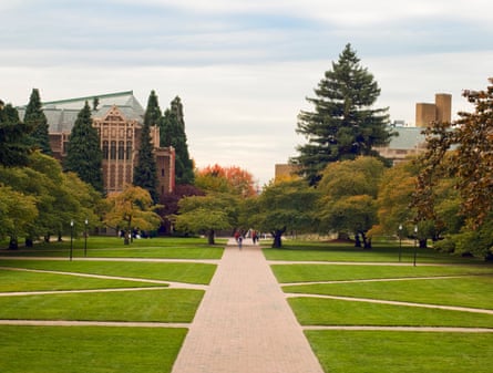 University field pinch intersecting paths and students stepping betwixt buildings