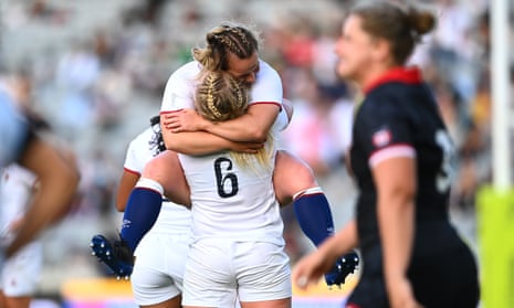 Alex Matthews and Maud Muir of England celebrate winning the Rugby World Cup 2021 semifinal against Canada at Eden Park on November 5, 2022, in Auckland.