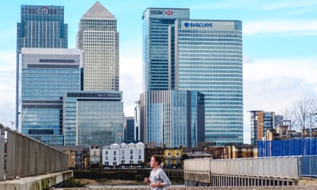 The Thames Path in North Greenwich, with a view of Canary Wharf.