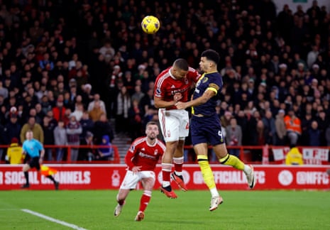 Bournemouth's Dominic Solanke heads home their equaliser at Nottingham Forest.