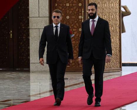 French president Emmanuel Macron is greeted by Syrian president Ahmad al-Sharaa at the Presidential Palace in Damascus, Syria.