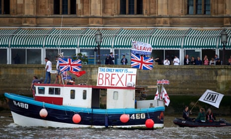 A ‘Fishing for Leave’ boat sails past the Houses of Parliament, 15 June 2016. 