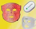 A person wears a grey LED face mask, shown beside two other facial skincare masks.