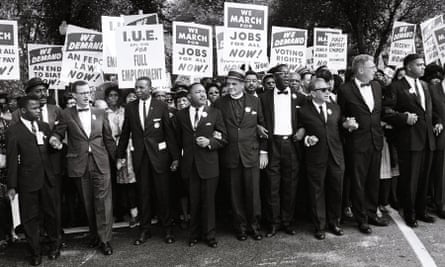 Martin Luther King and other civil rights leaders lead a crowd of hundreds of thousands at the March on Washington for Jobs and Freedom in August 1963.