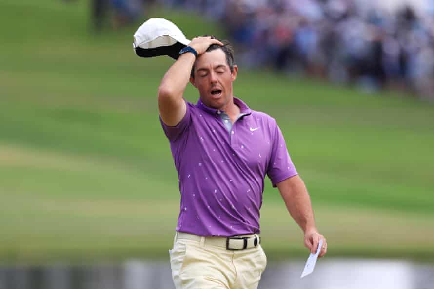 Rory McIlroy reacts on the 18th green.