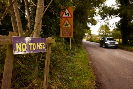 A Cheshire country road, a sign reads ‘NO TO HS2’