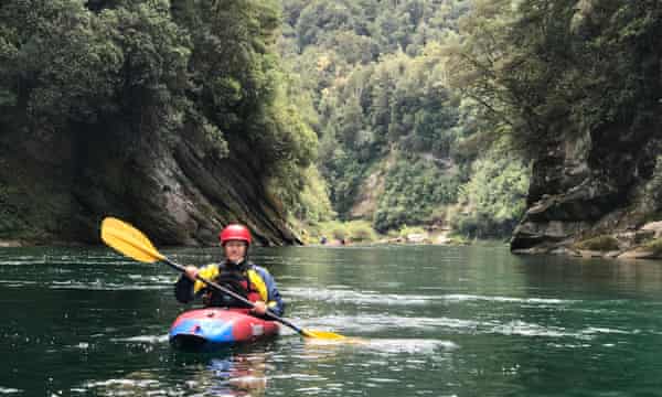 Caroline Crick kayaking on the Mātakitaki River, New Zealand.