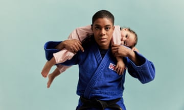 Nekoda Smythe-Davis with her daughter with Ryia, two. Smythe-Davis  is dressed in her judo outfit