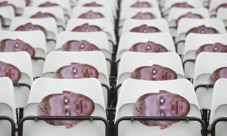 Ben Stokes masks on seats before play.