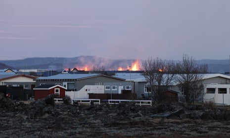 Smoke and flames from the volcano north of Grindavik on January 14