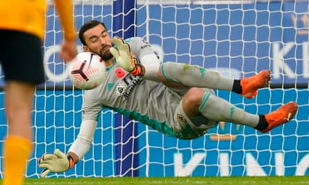 The Wolves goalkeeper, Rui Patrício, saves Jamie Vardy’s second penalty of the match after diving to his right.