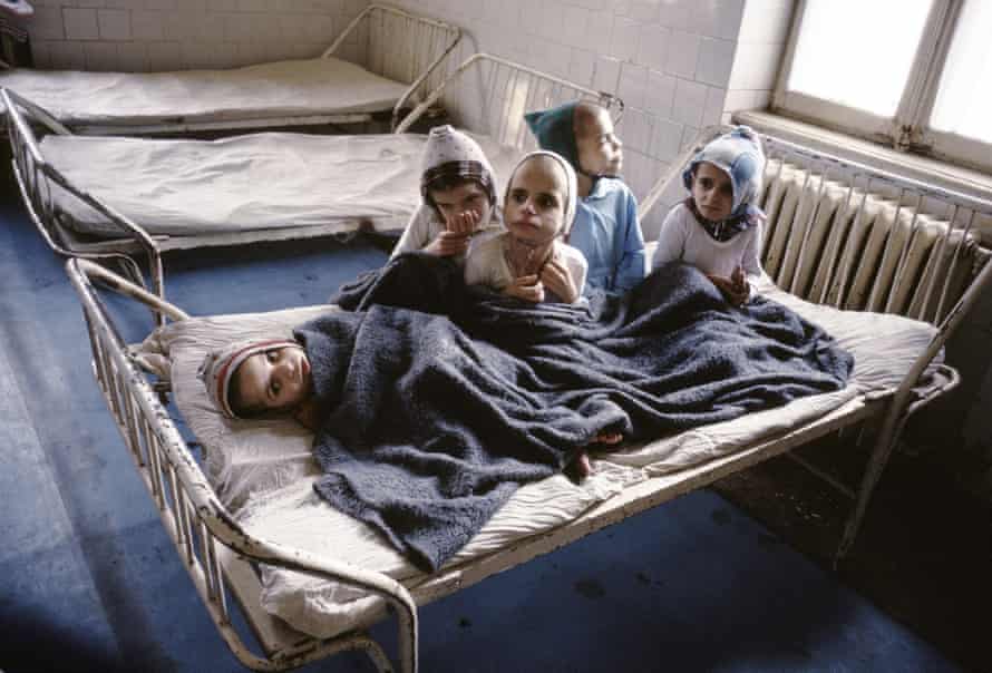 Orphans share a bed in Stefan Nicolau hospital Bucharest, Romania 1990.