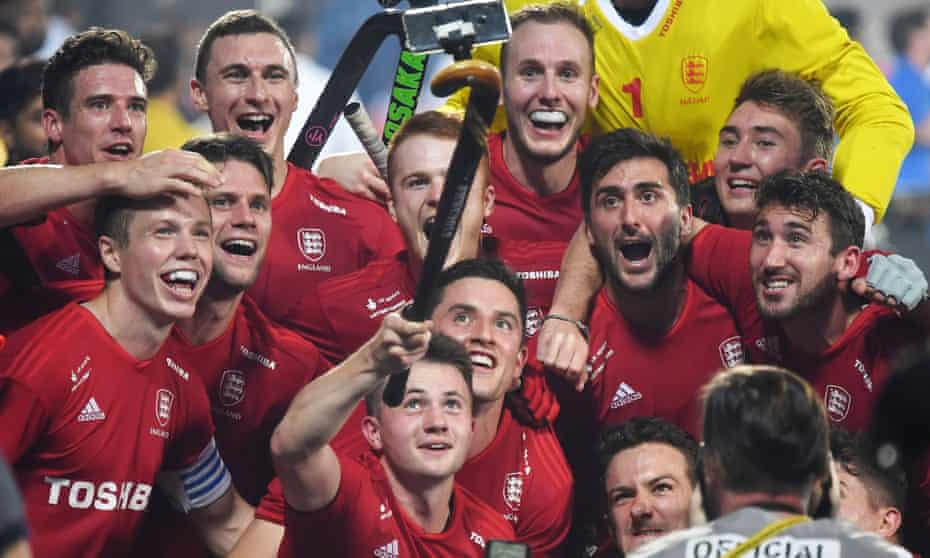 England’s players celebrate after victory in the hockey World Cup quarter-final on Wednesday.