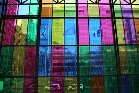 Multicoloured window through which you can see the traffic on the streets of Montreal, Canada.