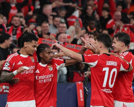 Richard Ríos (left) takes the acclaim of his Benfica teammates after scoring the second goal against Napoli in Lisbon.
