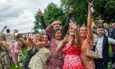 A group of happy racegoers take a selfie during a live concert at Ascot Racecourse