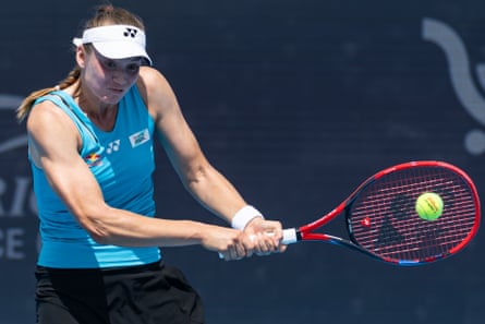 Elena Rybakina hits a backhand against Iga Swiatek.