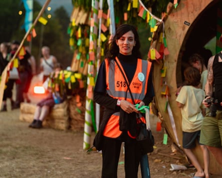 Mina wearing a hi-vis orange jacket