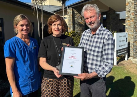 Sam Neill stands with nurse Courtney Lake (left) and thechief executive of Dunstan Hospital, Hayley Anderson. Neill was a patron of the rural hospital in Clyde.