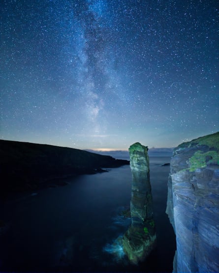 The Milky Way visible over Yesnaby sea stack in the Orkney Islands.