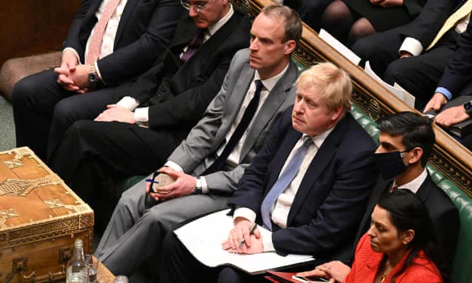 Dominic Raab, justice secretary (left) with the prime minister in the Commons on Monday.