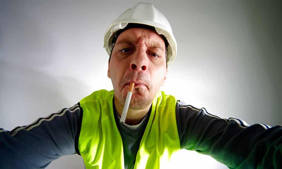 Construction worker grabbing out with cigarette in his mouth