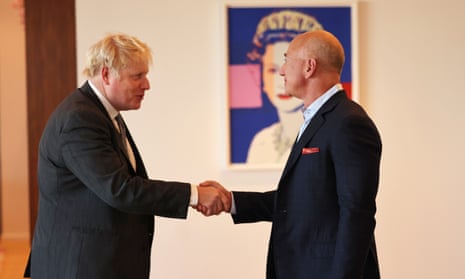 British PM Boris Johnson greets Amazon founder Jeff Bezos at the UK diplomatic residence in New York City in September 2021