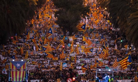 Pro-independence demonstrators march in Barcelona against the imprisonment of ousted members of Catalan government.