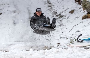 Snow in Forest Falls, CA, Valley of the Falls Dr, Forest Falls, California, Usa - 28 Dec 2021Mandatory Credit: Photo by Gina Ferazzi/Los Angeles Times/REX/Shutterstock (12661958d) Matthew Eastman, 15, of Forest Falls sleds off a jump he built at the end of his driveway after Monday’s winter stormed blanketed the San Bernardino Mountains on December 28, 2021 in Forest Falls, California.(Gina Ferazzi / Los Angeles Times) Snow in Forest Falls, CA, Valley of the Falls Dr, Forest Falls, California, Usa - 28 Dec 2021