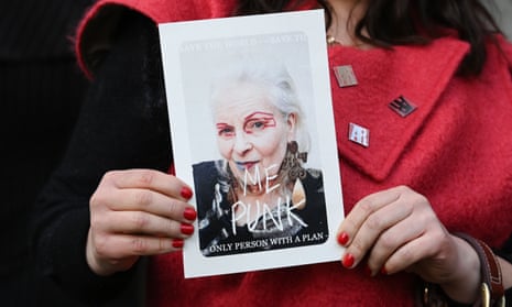 An attender at the Vivienne Westwood memorial holds an order of service